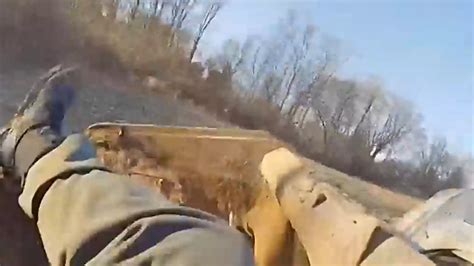 Video: Ohio deputy picked up in loader while pursuing suspect